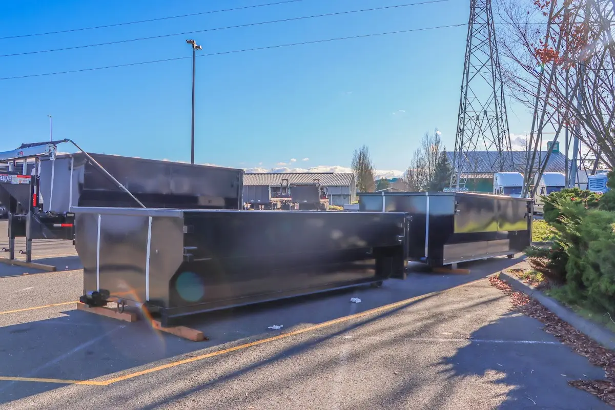 Roll-off dumpster ready for waste disposal at job site for 4 Yard Dumpster Rental in Vernon